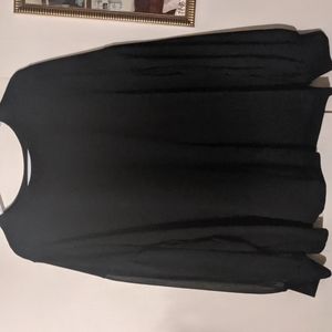 Sweater with sheer sleeves